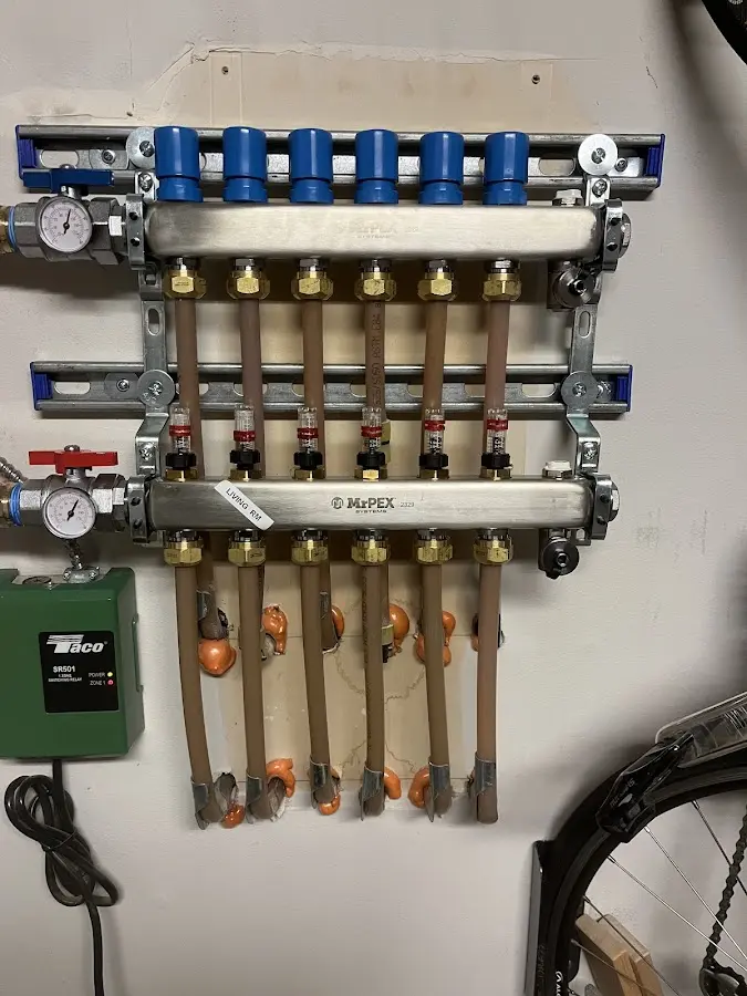 Plumber performing Gas Line Installation at a residential property in Kenmore